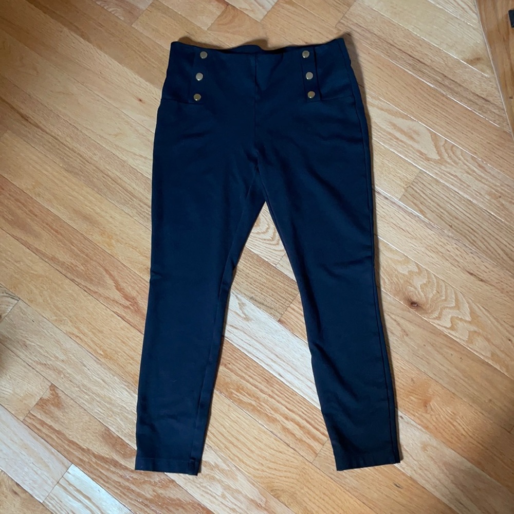 Black leggings with gold buttons